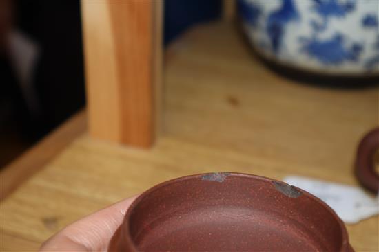 A Chinese squat baluster vase, crackle-glazed in green and red, a blue and white ginger jar and cover and a redware teapot